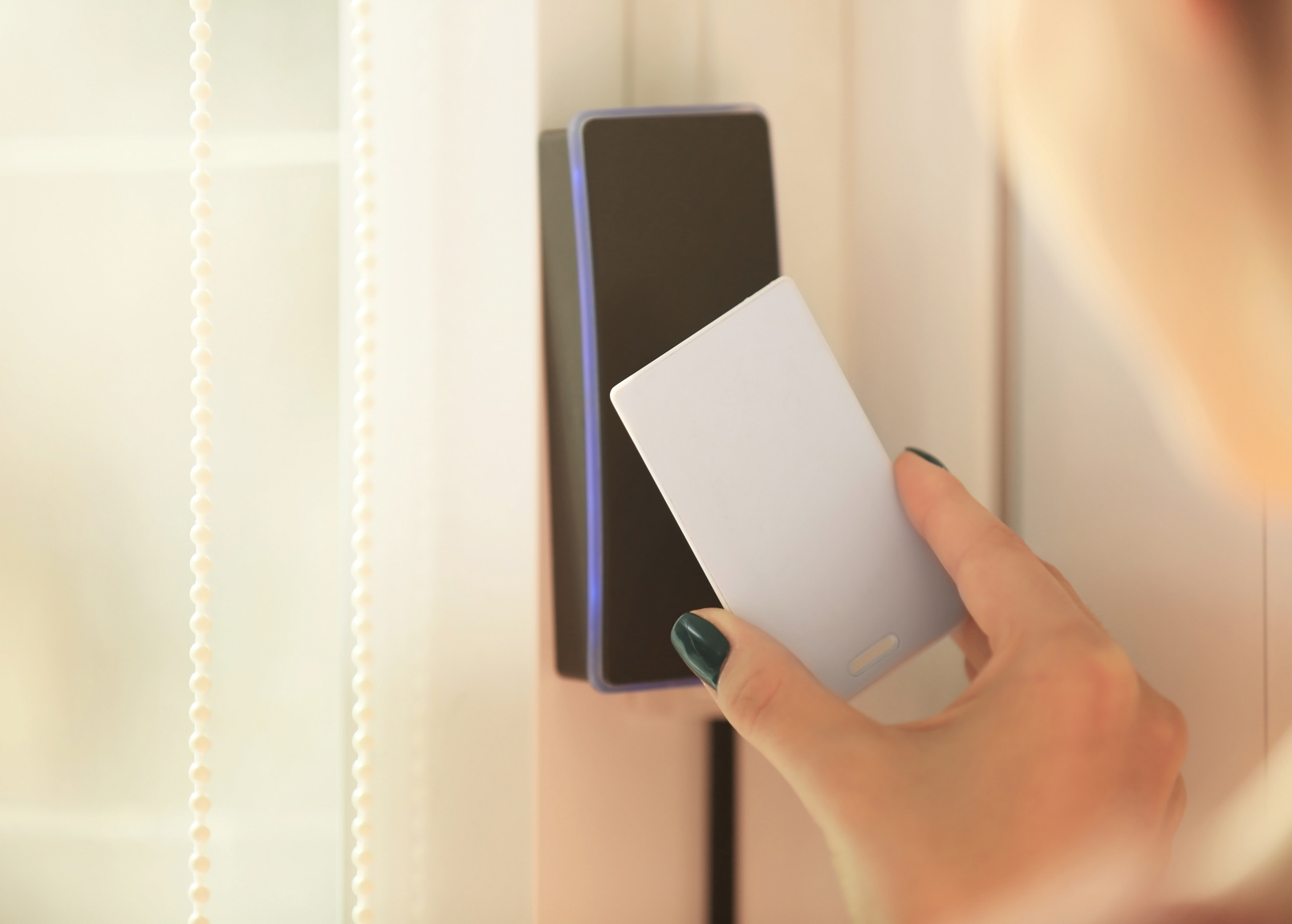 Woman Accessing Digital Door Lock with Security Card